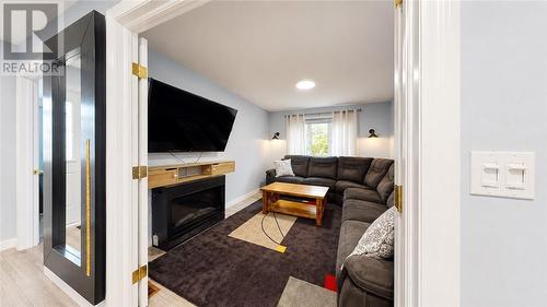 8 Blake, Little Current, ON - Indoor Photo Showing Living Room With Fireplace