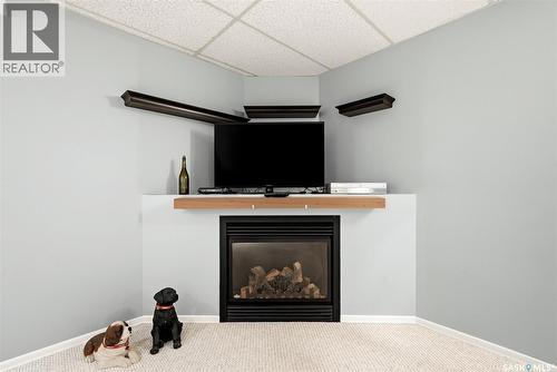 5831 Keffner Bay, Regina, SK - Indoor With Fireplace