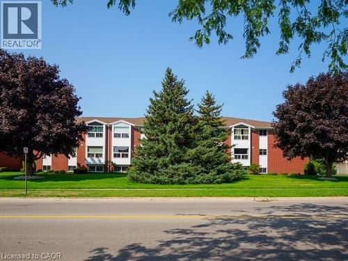 Front of building in great neighbourhood! - 60 Donly Drive S Unit# 206, Simcoe, ON - Outdoor With Facade