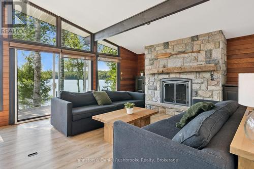 842 Emsdale Lake Road, Kearney, ON - Indoor Photo Showing Living Room With Fireplace