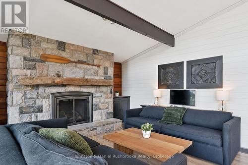 842 Emsdale Lake Road, Kearney, ON - Indoor Photo Showing Living Room With Fireplace
