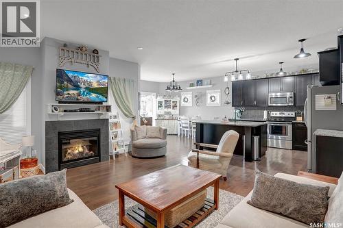 5471 Universal Crescent, Regina, SK - Indoor Photo Showing Living Room With Fireplace