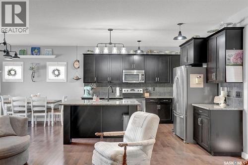5471 Universal Crescent, Regina, SK - Indoor Photo Showing Kitchen With Stainless Steel Kitchen With Upgraded Kitchen