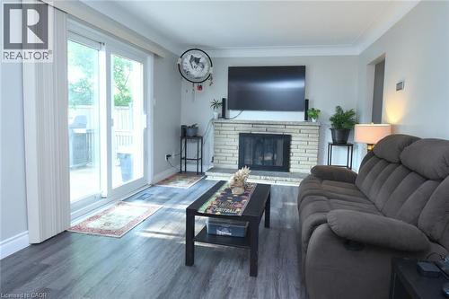 57 East 31St Street, Hamilton, ON - Indoor Photo Showing Living Room With Fireplace