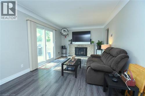 57 East 31St Street, Hamilton, ON - Indoor Photo Showing Living Room With Fireplace
