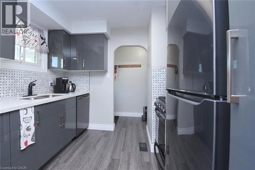57 East 31St Street, Hamilton, ON - Indoor Photo Showing Kitchen With Double Sink