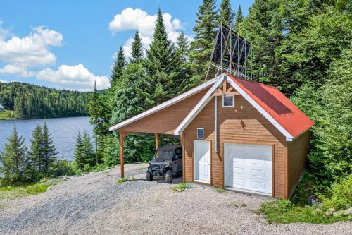 Garage - 1 Lac Delaney, Saint-Raymond, QC - Outdoor With Body Of Water