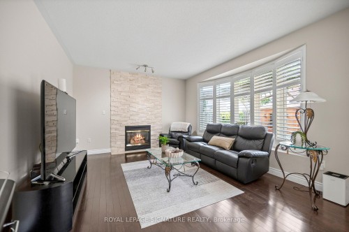 7134 Hallsands Drive, Mississauga, ON - Indoor Photo Showing Living Room With Fireplace