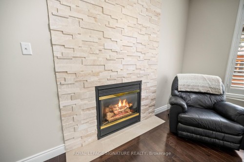 7134 Hallsands Drive, Mississauga, ON - Indoor Photo Showing Living Room With Fireplace