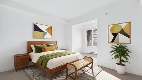 306-1550 Dickson Avenue, Kelowna, BC - Indoor Photo Showing Bedroom