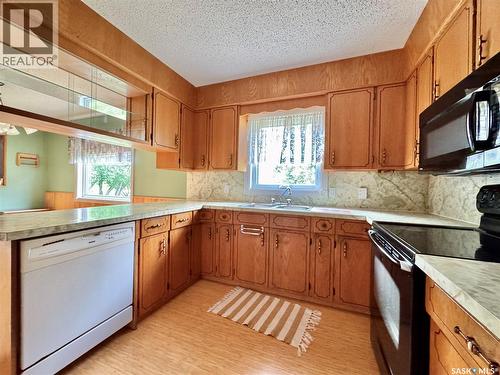 100 Henderson Street, Grayson, SK - Indoor Photo Showing Kitchen With Double Sink