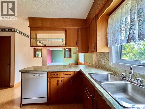100 Henderson Street, Grayson, SK - Indoor Photo Showing Kitchen With Double Sink