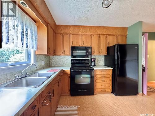 100 Henderson Street, Grayson, SK - Indoor Photo Showing Kitchen With Double Sink