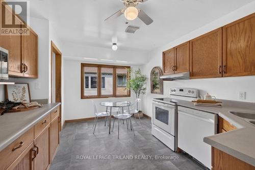 AI generated kitchen table and chairs - 7 Fanjoy Drive, St. Thomas, ON - Indoor Photo Showing Kitchen