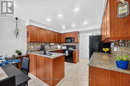 23 Eldad Drive, Clarington, ON - Indoor Photo Showing Kitchen With Double Sink