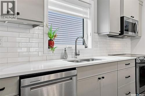 222 Dubois Crescent, Saskatoon, SK - Indoor Photo Showing Kitchen With Double Sink With Upgraded Kitchen