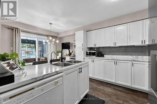 23 - 430 Mapleview Drive E, Barrie, ON - Indoor Photo Showing Kitchen With Double Sink