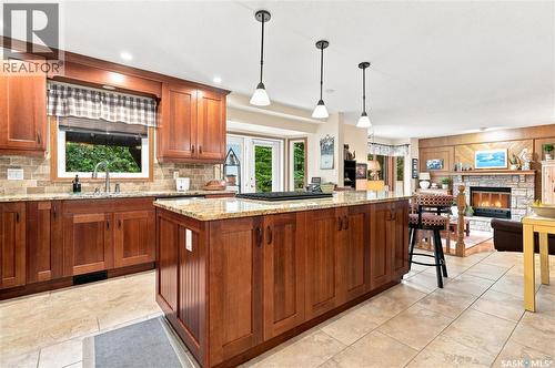 6723 Maple Ridge Drive, Regina, SK - Indoor Photo Showing Kitchen With Fireplace With Upgraded Kitchen