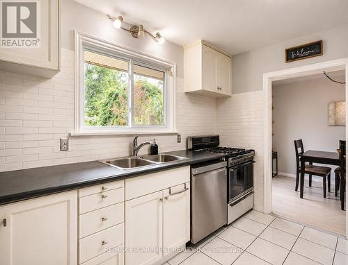 120 Stone Church Road W, Hamilton, ON - Indoor Photo Showing Kitchen With Double Sink