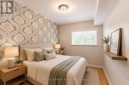 VIRTUALLY STAGED - 120 Stone Church Road W, Hamilton, ON - Indoor Photo Showing Bedroom