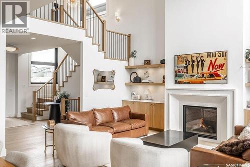 656 Pepper Bend, Saskatoon, SK - Indoor Photo Showing Living Room With Fireplace