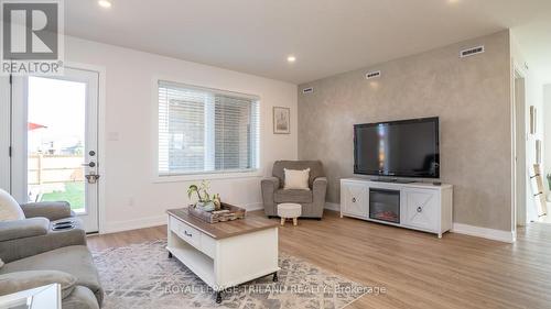 Door to Patio and Fenced Yard - 138 Renaissance Drive, St. Thomas, ON - Indoor Photo Showing Living Room