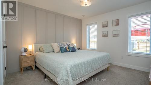 Primary Bedroom with Feature Wall - 138 Renaissance Drive, St. Thomas, ON - Indoor Photo Showing Bedroom
