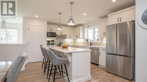 Kitchen Pantry and Stainless Steel Appliances - 138 Renaissance Drive, St. Thomas, ON - Indoor Photo Showing Kitchen With Upgraded Kitchen