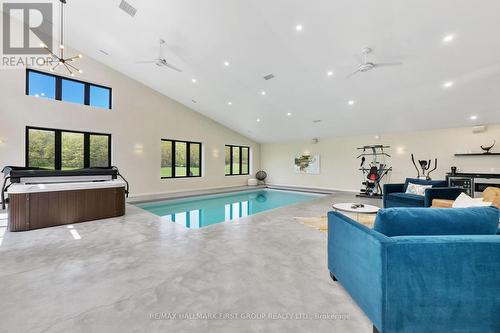 4566 Harwood Road, Hamilton Township, ON - Indoor Photo Showing Other Room With In Ground Pool