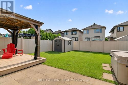 Garden removed by photo enhancement - 207 Mareth Way, Ottawa, ON - Outdoor With Backyard