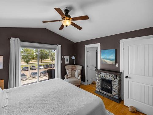 263 King Street, Charlottetown, PE - Indoor Photo Showing Bedroom With Fireplace