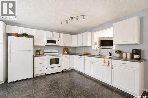 2518 7Th Avenue E, Regina, SK - Indoor Photo Showing Kitchen With Double Sink