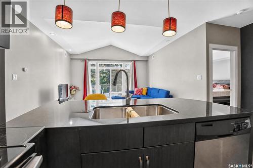 302 721 8Th Street E, Saskatoon, SK - Indoor Photo Showing Kitchen With Double Sink