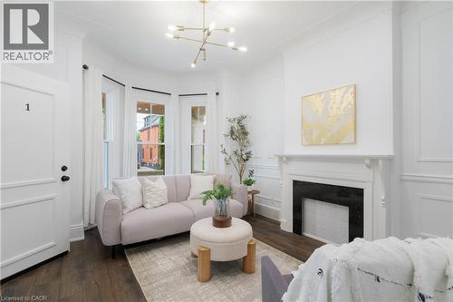 46 Murray Street E, Hamilton, ON - Indoor Photo Showing Living Room With Fireplace