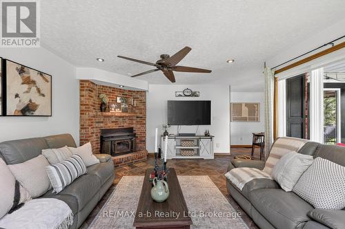 403745 Union Road, Ingersoll (Ingersoll - South), ON - Indoor Photo Showing Living Room With Fireplace