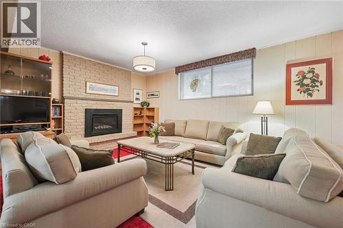 30 Shuh Avenue, Kitchener, ON - Indoor Photo Showing Living Room With Fireplace