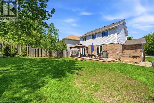 Expansive backyard with a large wooden deck featuring a gazebo - 784 Butternut Avenue, Waterloo, ON - Outdoor With Deck Patio Veranda