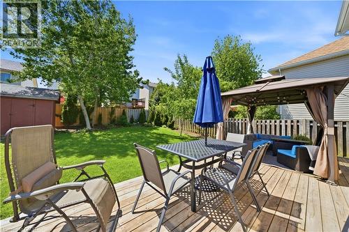 Expansive wood deck featuring a covered gazebo and a separate dining area - 784 Butternut Avenue, Waterloo, ON - Outdoor With Deck Patio Veranda With Exterior