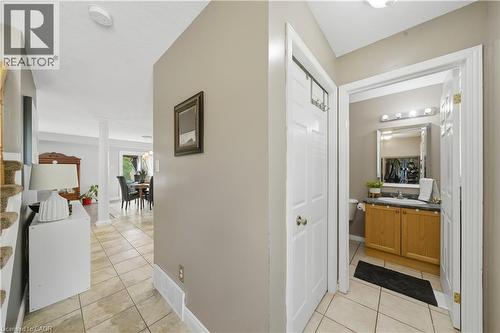 Neutral-toned entryway with tile flooring and white trim - 784 Butternut Avenue, Waterloo, ON - Indoor Photo Showing Other Room