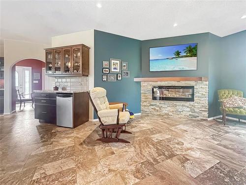 155059 Pth 16 Highway, Foxwarren, MB - Indoor Photo Showing Living Room With Fireplace