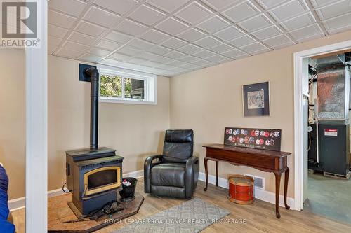 1403B Everett Lane, Frontenac (Frontenac South), ON - Indoor With Fireplace