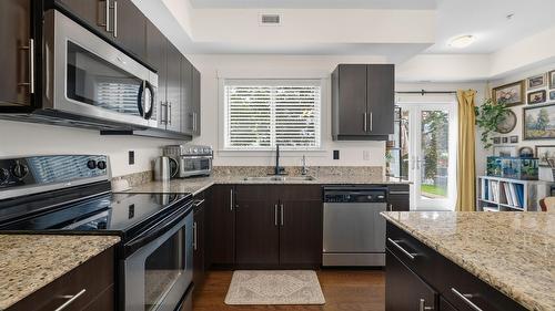 108-1957 Kane Road, Kelowna, BC - Indoor Photo Showing Kitchen With Stainless Steel Kitchen