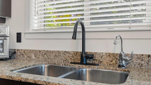 108-1957 Kane Road, Kelowna, BC - Indoor Photo Showing Kitchen With Double Sink