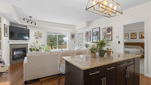 108-1957 Kane Road, Kelowna, BC - Indoor With Fireplace