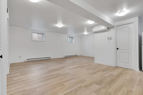 Salon - 5705A Rue Alphonse, Brossard, QC - Indoor Photo Showing Other Room