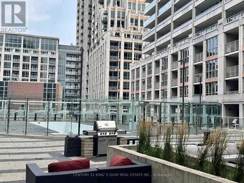 BBQ area - 1233 - 38 Grand Magazine Street, Toronto, ON - Outdoor With Balcony With Facade