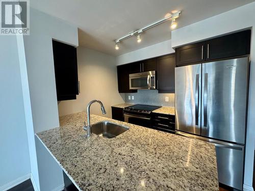 1233 - 38 Grand Magazine Street, Toronto, ON - Indoor Photo Showing Kitchen With Stainless Steel Kitchen With Upgraded Kitchen