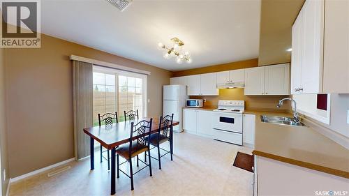 13 809 Kristjanson Road, Saskatoon, SK - Indoor Photo Showing Kitchen With Double Sink