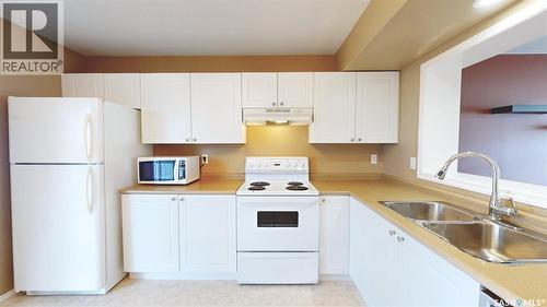 13 809 Kristjanson Road, Saskatoon, SK - Indoor Photo Showing Kitchen With Double Sink