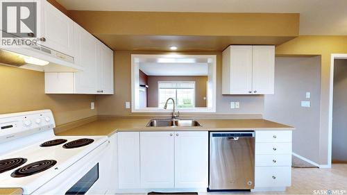 13 809 Kristjanson Road, Saskatoon, SK - Indoor Photo Showing Kitchen With Double Sink